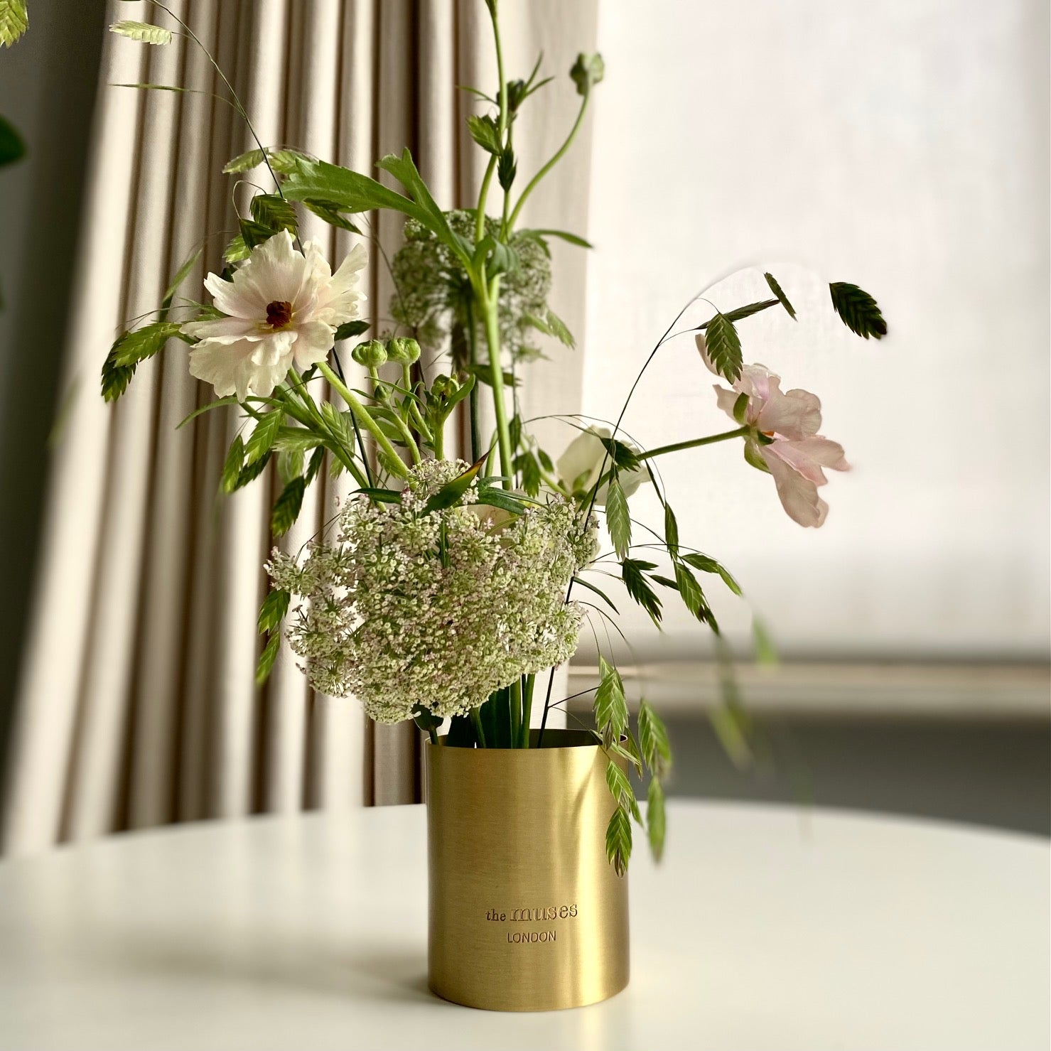 Repurposed Muses container flower vase